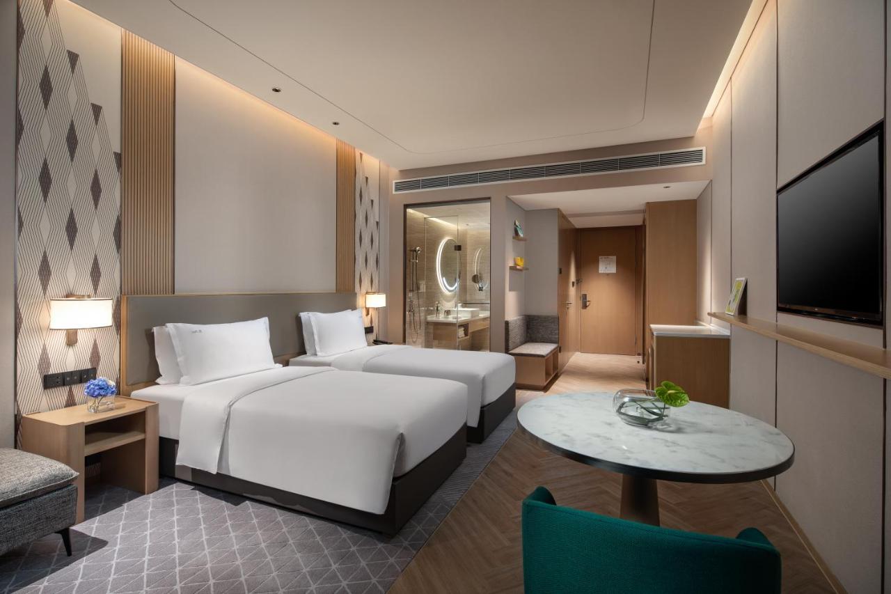Holiday Inn Wuxi Central Station By Ihg מראה חיצוני תמונה