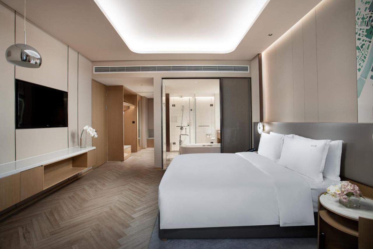 Holiday Inn Wuxi Central Station By Ihg מראה חיצוני תמונה