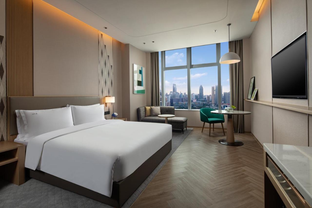 Holiday Inn Wuxi Central Station By Ihg מראה חיצוני תמונה