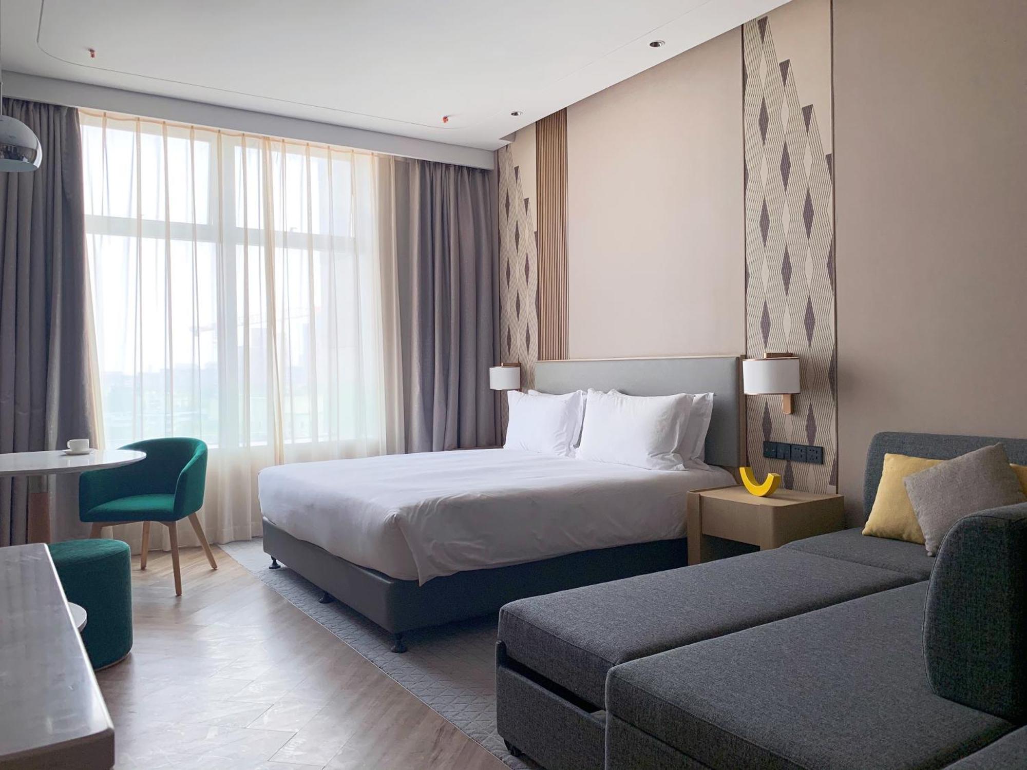 Holiday Inn Wuxi Central Station By Ihg מראה חיצוני תמונה